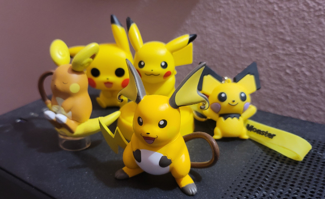 Image of my pikachu/raichu figurine on top of my dusty computer tower